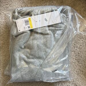 Nike women's club fleece oversized mock neck sweatshirt.